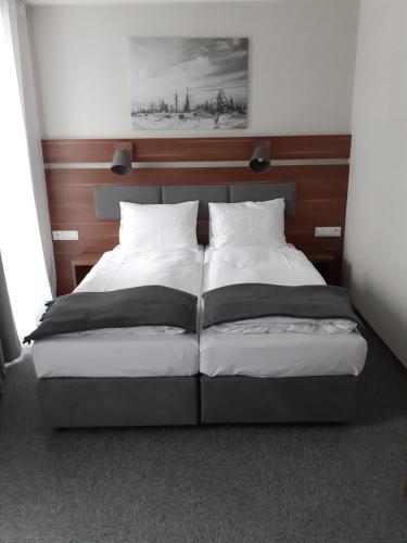 
Łóżko lub łóżka w pokoju w obiekcie Gucio
