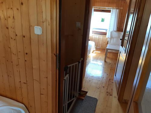 Postel nebo postele na pokoji v ubytování Domki BLANKA Jastarnia