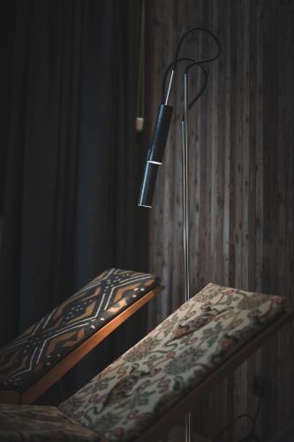 a lamp sitting on top of a table at Niedermairhof in Brunico