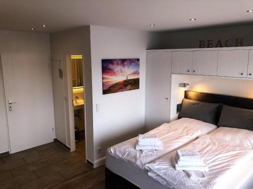 Ein Bett oder Betten in einem Zimmer der Unterkunft Appartment Wilhelmstrasse