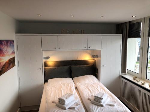 Ein Bett oder Betten in einem Zimmer der Unterkunft Appartment Wilhelmstrasse