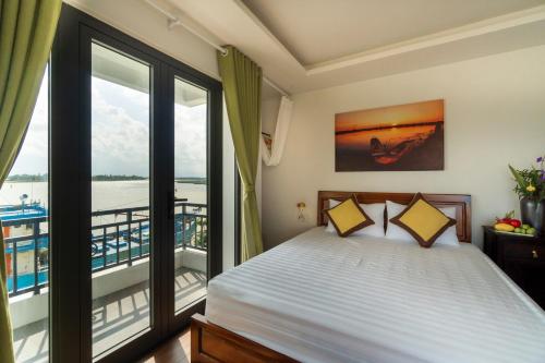 Katil atau katil-katil dalam bilik di Autumn Bay Riverside Villa