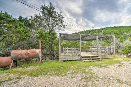 a wooden shelter with a rusted gas istg istg at Cedar Falls Cabin 5 half Mile to Turner Falls in Davis