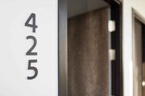 a number on the side of a building at The Gene in Krabi town