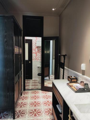 Postel nebo postele na pokoji v ubytování Guangzhou Nansha Stone Inn
