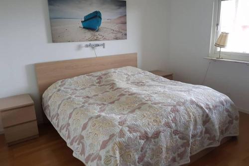 Postel nebo postele na pokoji v ubytování Modern villa i Arild med spektakulär havsutsikt.