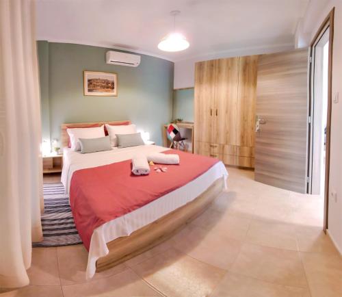 Postel nebo postele na pokoji v ubytování Helianthos Villa - Apartment No4
