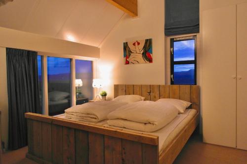 Postel nebo postele na pokoji v ubytování villa Ooghduyne