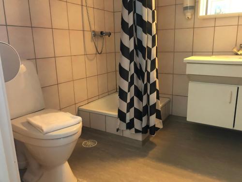Ett badrum på Løgstør Badehotel - Hotel du Nord