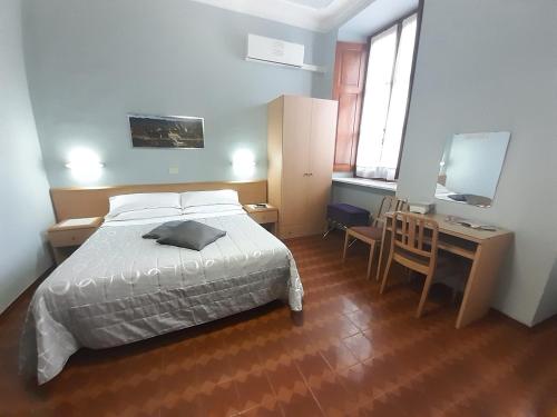 Postel nebo postele na pokoji v ubytování Hotel Alba Torino centro