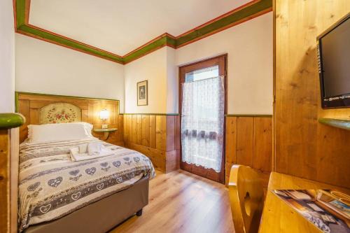 Cama o camas de una habitación en Hotel Alemagna
