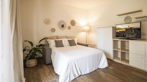 Ένα ή περισσότερα κρεβάτια σε δωμάτιο στο Residence Bianca