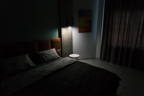Ένα ή περισσότερα κρεβάτια σε δωμάτιο στο Vip apartmen loft