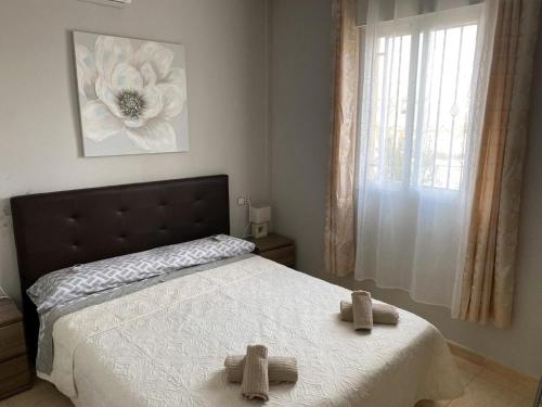 Ένα ή περισσότερα κρεβάτια σε δωμάτιο στο Bungalow in Alberca, La Nucia