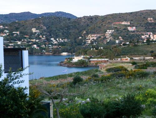 a view of a body of water with a town at Chris Villa in Perdhika