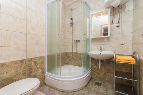 Koupelna v ubytování Apartments Ricina