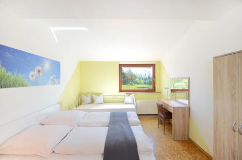 Ένα ή περισσότερα κρεβάτια σε δωμάτιο στο Flat Strasbourg - Europapark / Wallaston