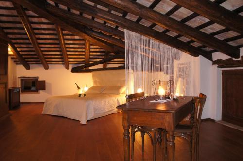 Postel nebo postele na pokoji v ubytování Agriturismo Ronchi Di Sant'Egidio