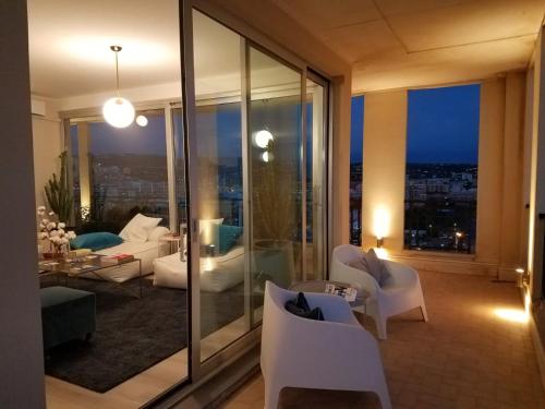 a living room with a view of a city at B&B Seataly Experience in Civitavecchia
