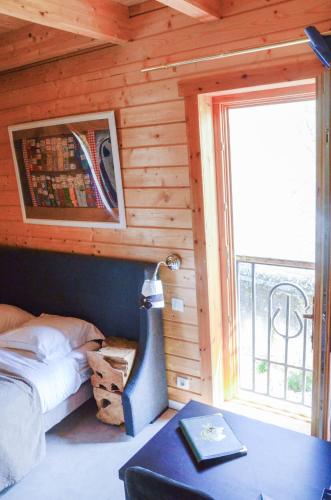 Postel nebo postele na pokoji v ubytování Logis Hôtel La Villa Boucicaut