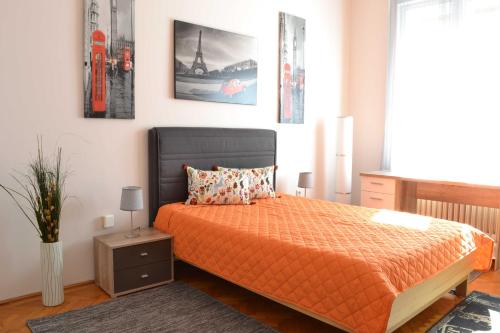 Posteľ alebo postele v izbe v ubytovaní Paprika Apartment Grand