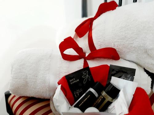 a pile of toiletries and a pile of towels at Risorgimento in Avezzano