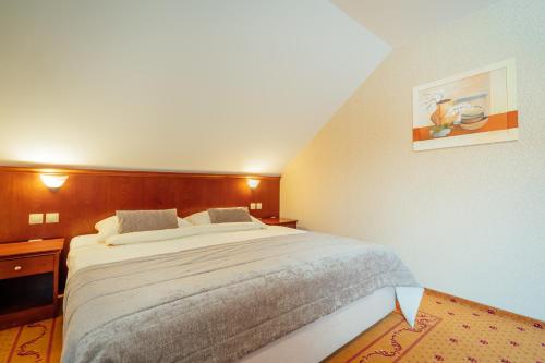 Ένα ή περισσότερα κρεβάτια σε δωμάτιο στο Kala B&B