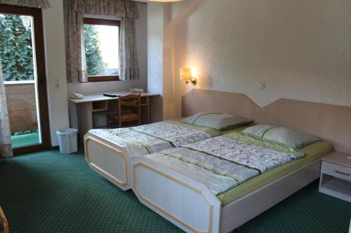 Katil atau katil-katil dalam bilik di Hotel Alte Viehweide
