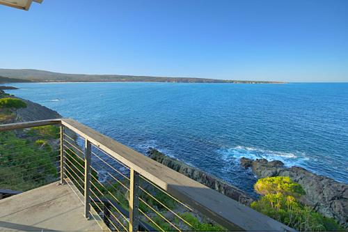 a view of the ocean from a balcony at Eagle Heights Holiday Units in Eden