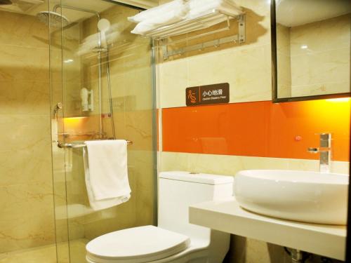 Een badkamer bij 7Days Premium Changsha Xiangya Fu'eryuanjialing Branch