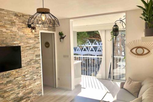 Studio cosy 30 m2 climatisé au centre ville de LGM