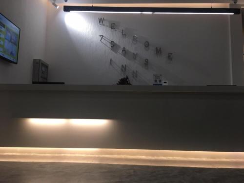 Fotografie z fotogalerie ubytování 7Days Inn Zhangshu Xingfo Road Branch v destinaci Daqiao