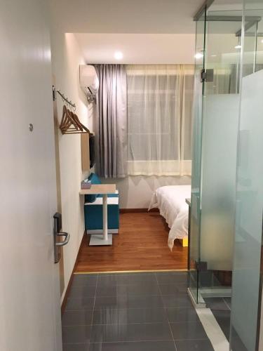 Fotografie z fotogalerie ubytování 7 Days Hotel Taixing Wenchang Road Branch v destinaci Taizhou