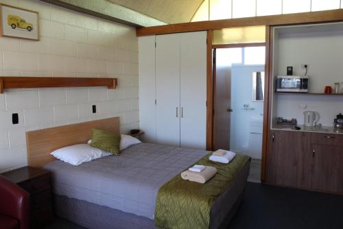 Krevet ili kreveti u jedinici u okviru objekta Elmore Lodge Motel