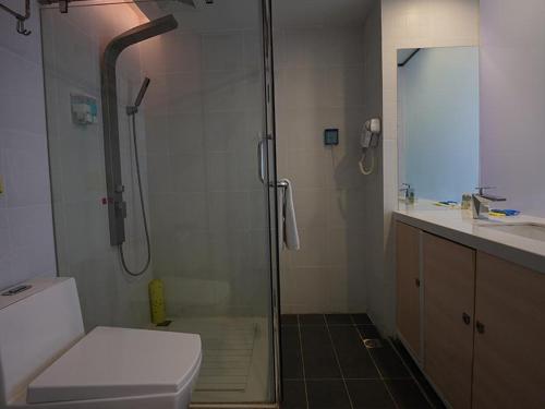 Un baño de 7Days Inn Zhaotong Academy Fada Square Branch