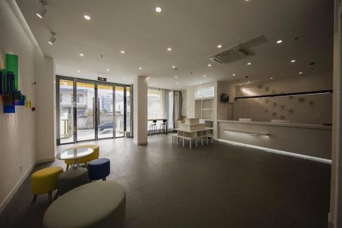 Fotografie z fotogalerie ubytování 7Days Inn Ya'an Xingjing Center Branch v destinaci Ya'an