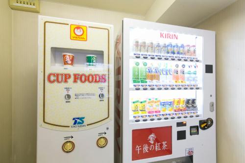 two vending machines are next to each other at Hotel S-Plus Hiroshima Peace Park in Hiroshima