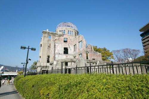 an old building with a dome on top of it at Hotel S-Plus Hiroshima Peace Park in Hiroshima