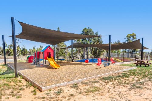a playground with a tent and a slide at Tasman Holiday Parks - Lake Mulwala in Mulwala