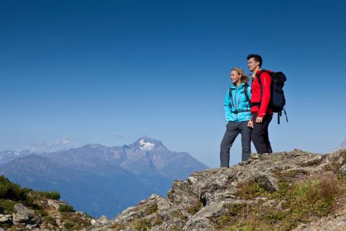 a man and a woman standing on top of a mountain at Apartmenthaus Juen in Zams