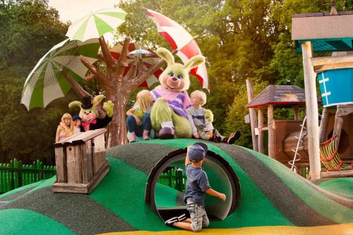 a group of children playing on a playground at Lisebergsbyns B&B in Gothenburg