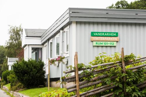 a building with a sign on the side of it at Lisebergsbyns Vandrarhem in Gothenburg