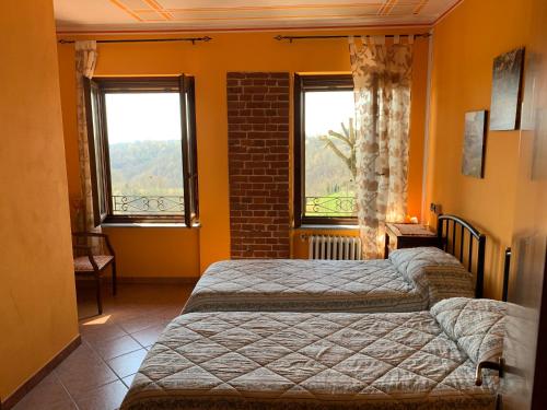 A bed or beds in a room at Agriturismo Tre Tigli