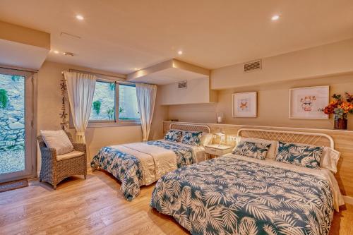 מיטה או מיטות בחדר ב-Gran casa al lado de la playa y Barcelona Centro