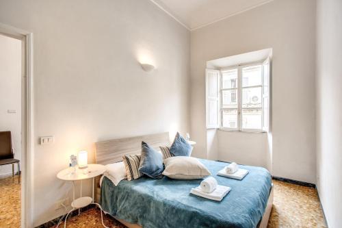 Кровать или кровати в номере Colonna Suite - Rome Termini Station Big Apartment