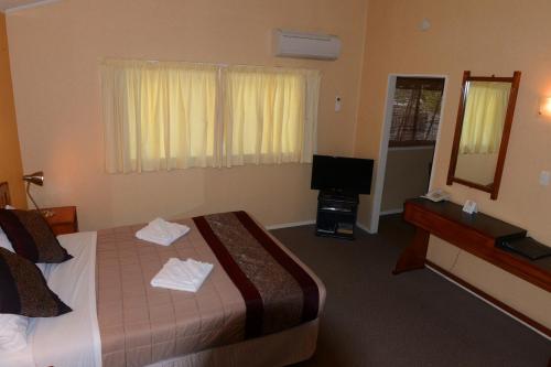 Posteľ alebo postele v izbe v ubytovaní Classic Motel