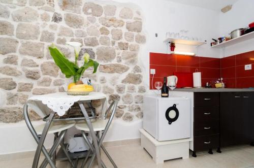 Kuchyňa alebo kuchynka v ubytovaní Apartment Lee Loo