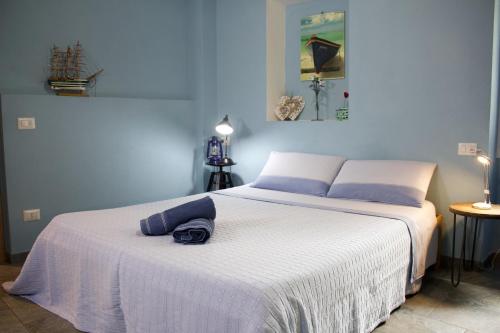 Säng eller sängar i ett rum på La Casa Sul Sasso