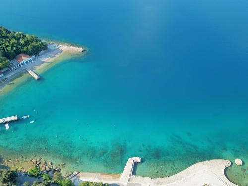 an aerial view of a body of water at Elements Camping Selce Mobile homes in Selce