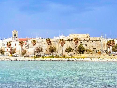 a view of the old city of jerusalem from the water at Trentatre Quarantatre in Mola di Bari